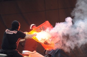Serbian supporters burn an Albanian flag before the European 2012 qualifyng football match between Italy and Serbia is suspended due to fan violence at Luigi Ferraris stadium in Genoa on October 12, 2010. AFP Serbian supporters burn an Albanian flag before the European 2012 qualifyng football match between Italy and Serbia is suspended due to fan violence at Luigi Ferraris stadium in Genoa on October 12, 2010. AFP