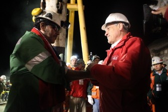 Miner Luis Urzua (L) greets President Sebastian Pinera (R) after reaching the surface from the San Jose mine, near Copiapo, Chile on October 13, 2010. AFP Miner Luis Urzua (L) greets President Sebastian Pinera (R) after reaching the surface from the San Jose mine, near Copiapo, Chile on October 13, 2010. AFP