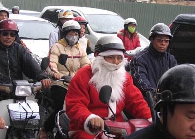 This undated file photo shows motorcyclists during a cold spell last year in northern Vietnam This undated file photo shows motorcyclists during a cold spell last year in northern Vietnam