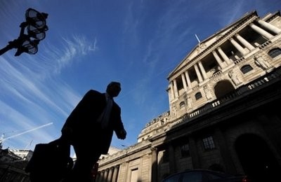 A man walks past the Bank of England. Almost half of Britons think that major cuts in public spending due to be unveiled this week will be unfair but they trust ministers more than the opposition to fix the economy, a poll revealed Sunday A man walks past the Bank of England. Almost half of Britons think that major cuts in public spending due to be unveiled this week will be unfair but they trust ministers more than the opposition to fix the economy, a poll revealed Sunday