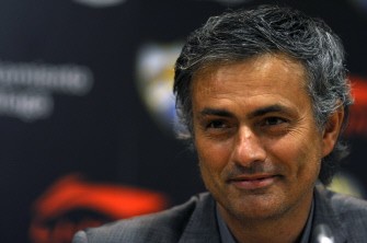 Real Madrid's coach Jose Mourinho smiles during their Spanish league football match Malaga against Real Madrid at Rosaleda stadium on October 16, 2010 in Malaga. Real Madrid won 4-1. AFP Real Madrid's coach Jose Mourinho smiles during their Spanish league football match Malaga against Real Madrid at Rosaleda stadium on October 16, 2010 in Malaga. Real Madrid won 4-1. AFP