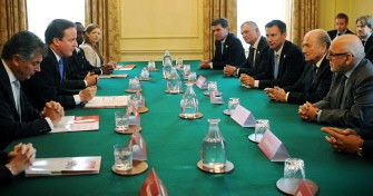 British Prime Minister David Cameron (2nd L), holds a meeting with and FIFA President Sepp Blatter (2nd R), in the cabinet room of 10 Downing Street in central London, on October 13, 2010. AFP British Prime Minister David Cameron (2nd L), holds a meeting with and FIFA President Sepp Blatter (2nd R), in the cabinet room of 10 Downing Street in central London, on October 13, 2010. AFP