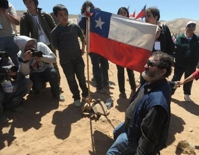 Chilean miner Jorge Galleguillos (R), one of the 33 recently rescued from the San Jose mine, is shown back at the mine for a Mass on October 17, 2010. AFP Chilean miner Jorge Galleguillos (R), one of the 33 recently rescued from the San Jose mine, is shown back at the mine for a Mass on October 17, 2010. AFP