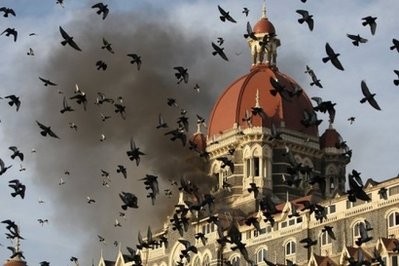 Flames gush out of The Taj Mahal Hotel in Mumbai during a violent attack on the landmark building by militant gunmen in November 2008 Flames gush out of The Taj Mahal Hotel in Mumbai during a violent attack on the landmark building by militant gunmen in November 2008