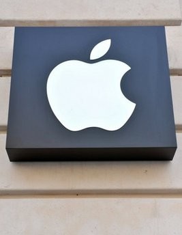 Apple has reported record quarterly revenue led by blockbuster sales of its latest generation iPhone and took shots at rivals Google and Research In Motion Apple has reported record quarterly revenue led by blockbuster sales of its latest generation iPhone and took shots at rivals Google and Research In Motion