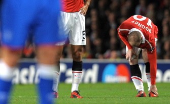 (AFP) A file photo taken on September 14, 2010, shows Wayne Rooney holding his ankle after he was injured in a tackle, during their UEFA Champions League Group C football match against Rangers, at Old Trafford in Manchester, north-west England. (AFP) A file photo taken on September 14, 2010, shows Wayne Rooney holding his ankle after he was injured in a tackle, during their UEFA Champions League Group C football match against Rangers, at Old Trafford in Manchester, north-west England.