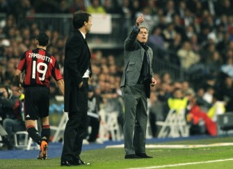 Real Madrid coach Jose Mourinho (R) gestures in front of AC Milan's Brazilian coach Massimiliano Allegri (L) during their Champions league group G football match at Santiago Bernabeu stadium in Madrid on October 19, 2010. AFP Real Madrid coach Jose Mourinho (R) gestures in front of AC Milan's Brazilian coach Massimiliano Allegri (L) during their Champions league group G football match at Santiago Bernabeu stadium in Madrid on October 19, 2010. AFP