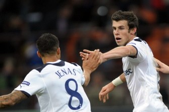 Gareth Bale celebrates after scoring with Tottenham's midfielder Jermaine Jenas (L) during their UEFA Champions League football match against Inter Milan on October 20, 2010. Inter Milan defeated Tottenham Hotspur 4-3. AFP Gareth Bale celebrates after scoring with Tottenham's midfielder Jermaine Jenas (L) during their UEFA Champions League football match against Inter Milan on October 20, 2010. Inter Milan defeated Tottenham Hotspur 4-3. AFP