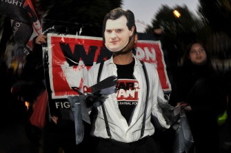 A demonstrator wearing a mask depicting British Chancellor of the Exchequer, George Osborne, protests against goverment spending cuts in central London on October 20, 2010. AFP A demonstrator wearing a mask depicting British Chancellor of the Exchequer, George Osborne, protests against goverment spending cuts in central London on October 20, 2010. AFP