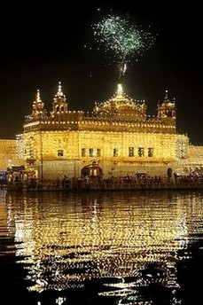 Indian Sikh devotees watch a firework display above Sikhism's holiest shrine, The Golden Temple, in Amritsar on October 9. Indian Sikh devotees watch a firework display above Sikhism's holiest shrine, The Golden Temple, in Amritsar on October 9.