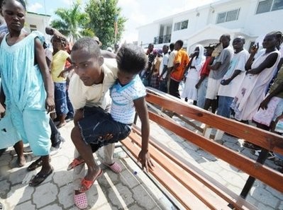 Sick people queue for medical treatment at a hospital close to Port-au-Prince amid a cholera outbreak. AFP Sick people queue for medical treatment at a hospital close to Port-au-Prince amid a cholera outbreak. AFP