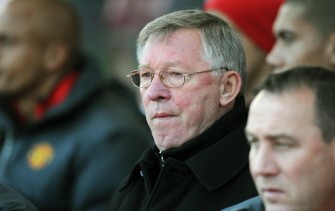 Sir Alex Ferguson looks on from the dugout ahead of the game against Stoke City on October 24, 2010. Manchester United won the game 2-1. AFP Sir Alex Ferguson looks on from the dugout ahead of the game against Stoke City on October 24, 2010. Manchester United won the game 2-1. AFP
