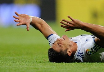 Cristiano Ronaldo reacts during their Spanish league football match Real Madrid vs Racing de Santander on October 23, 2010 in Madrid. AFP Cristiano Ronaldo reacts during their Spanish league football match Real Madrid vs Racing de Santander on October 23, 2010 in Madrid. AFP