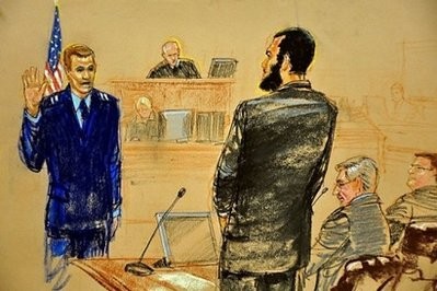 Omar Khadr (C) pleads guilty under oath in Guantanamo Bay. AFP Omar Khadr (C) pleads guilty under oath in Guantanamo Bay. AFP