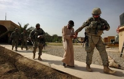 A man is detained by US troops for alleged links to al-Qaeda in Iraq in the restive Diyala Province, in 2008. AFP file A man is detained by US troops for alleged links to al-Qaeda in Iraq in the restive Diyala Province, in 2008. AFP file