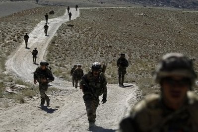 French soldiers patrol in Surobi district in September 2010. French soldiers patrol in Surobi district in September 2010.