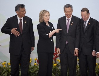 ASEAN Secretary General Surin Pitsuwan (L), US Secretary of State Hillary Rodham Clinton (2nd L), Singapore Prime Minister Lee Hsien Loong (2nd R) and New Zealand Prime Minister John Key talk before a family photo on the sidelines of the 17th summit of the Association of Southeast Asian Nations in Hanoi on October 30, 2010. AFP ASEAN Secretary General Surin Pitsuwan (L), US Secretary of State Hillary Rodham Clinton (2nd L), Singapore Prime Minister Lee Hsien Loong (2nd R) and New Zealand Prime Minister John Key talk before a family photo on the sidelines of the 17th summit of the Association of Southeast Asian Nations in Hanoi on October 30, 2010. AFP