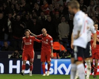 Liverpool's Argentine midfielder Maxi Rodríguez (L) celebrates with Liverpool's Raul Meireles after scoring during the English Premier League football match at the Reebok stadium, Bolton. AFP Liverpool's Argentine midfielder Maxi Rodríguez (L) celebrates with Liverpool's Raul Meireles after scoring during the English Premier League football match at the Reebok stadium, Bolton. AFP