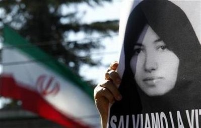 A demonstrator holds a picture of Sakineh Mohammadi Ashtiani, in front of the Iranian Embassy in Rome September 2. A demonstrator holds a picture of Sakineh Mohammadi Ashtiani, in front of the Iranian Embassy in Rome September 2.
