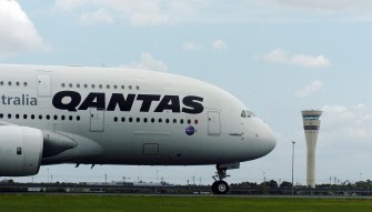 )AFP FILES) A Qantas Airbus A380 taxis past the control tower after touching down at Brisbane International Airport on November 15, 2005. )AFP FILES) A Qantas Airbus A380 taxis past the control tower after touching down at Brisbane International Airport on November 15, 2005.