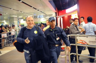 An unidentified passenger (L) is escorted from the terminal of Changi International airport in Singapore on November 4, 2010 after disembarking from the Qantas Airbus A380 aircraft. AFP An unidentified passenger (L) is escorted from the terminal of Changi International airport in Singapore on November 4, 2010 after disembarking from the Qantas Airbus A380 aircraft. AFP