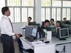 Students in a class at an IT training center Students in a class at an IT training center