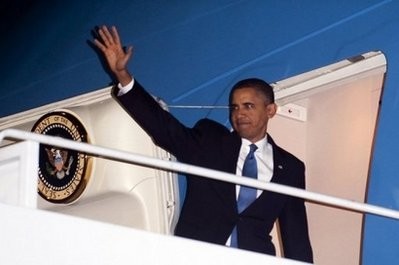 US President Barack Obama, seen here waving from Air Force One in Ramstein, on November 5, during a refueling stop enroute to Mumbai, India. US President Barack Obama, seen here waving from Air Force One in Ramstein, on November 5, during a refueling stop enroute to Mumbai, India.
