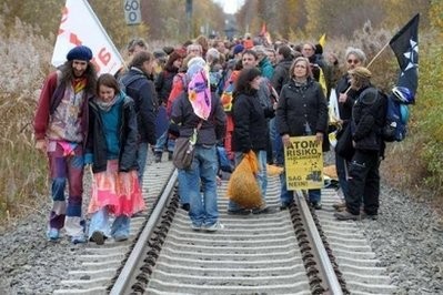 Anti-nuclear activists stand on the tracks during a protest in Berg near the Franco-German border against the arrival in Germany of a train carrying highly radioactive waste. Anti-nuclear activists stand on the tracks during a protest in Berg near the Franco-German border against the arrival in Germany of a train carrying highly radioactive waste.