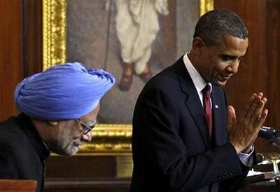 President Barack Obama bows and makes a greeting to the audience beside India's Prime Minister Manmohan Singh after delivering a speech at Parliament House in New Delhi, November 8, 2010. President Barack Obama bows and makes a greeting to the audience beside India's Prime Minister Manmohan Singh after delivering a speech at Parliament House in New Delhi, November 8, 2010.