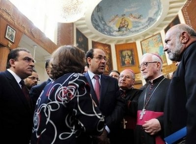 Handout picture shows Iraqi Prime Minister Nuri al-Maliki (C) speaking to Assyrian Catholic Bishop Matti Matoka (2nd r) and Chaldean Bishop Shlimun Warduni in Baghdad. Handout picture shows Iraqi Prime Minister Nuri al-Maliki (C) speaking to Assyrian Catholic Bishop Matti Matoka (2nd r) and Chaldean Bishop Shlimun Warduni in Baghdad.