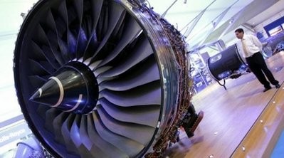 File photo shows a visitor looking at a Rolls Royce Trent 900 jet engine at the Farnborough Air Show File photo shows a visitor looking at a Rolls Royce Trent 900 jet engine at the Farnborough Air Show