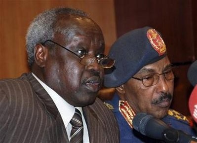 Sudan's Minister of Defence Abdel Rahim Mohamed Hussein talks to South's minister for the SPLA (the southern army) Nhial Deng Nhial after a joint news conference at the Ministry of Defence headquarters in Khartoum November 11, 2010 Sudan's Minister of Defence Abdel Rahim Mohamed Hussein talks to South's minister for the SPLA (the southern army) Nhial Deng Nhial after a joint news conference at the Ministry of Defence headquarters in Khartoum November 11, 2010