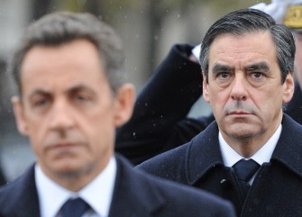 (AFP FILES) A file picture taken on November 11, 2010, in Paris, shows French President Nicolas Sarkozy (C) and Prime Minister Francois Fillon. (AFP FILES) A file picture taken on November 11, 2010, in Paris, shows French President Nicolas Sarkozy (C) and Prime Minister Francois Fillon.