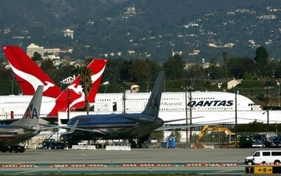 Two Qantas A380 superjumbo jets are shown grounded on the tarmac at Los Angeles International Airport Friday, Nov. 12, 2010, before being inspected Two Qantas A380 superjumbo jets are shown grounded on the tarmac at Los Angeles International Airport Friday, Nov. 12, 2010, before being inspected