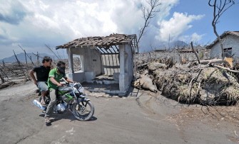 A dead livestock lies on the ground in the devastated village destroyed by the Mount Merapi eruption in Kraten district, Central Java, Indonesia on November 15, 2010. Thousands of Indonesian families returned to their villages Monday even as scientists warned Mount Merapi volcano remained a severe threat. AFP A dead livestock lies on the ground in the devastated village destroyed by the Mount Merapi eruption in Kraten district, Central Java, Indonesia on November 15, 2010. Thousands of Indonesian families returned to their villages Monday even as scientists warned Mount Merapi volcano remained a severe threat. AFP