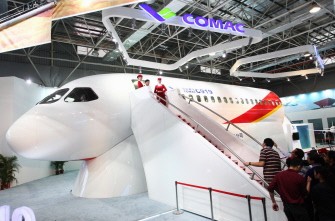 Visitors inspect the C919 prototype at an aviation exhibition during the Zhuhai Airshow, in south China's Guangzhou province on November 16, 2010. AFP Visitors inspect the C919 prototype at an aviation exhibition during the Zhuhai Airshow, in south China's Guangzhou province on November 16, 2010. AFP