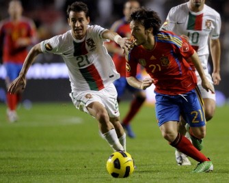 Portugal´s defender Joao Pereira (L) vies with Spain's midfielder David Silva (R) during their friendly football match at the Luz Stadium in Lisbon on November 17, 2010. AFP Portugal´s defender Joao Pereira (L) vies with Spain's midfielder David Silva (R) during their friendly football match at the Luz Stadium in Lisbon on November 17, 2010. AFP