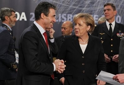 German Chancellor Angela Merkel talks with NATO Secretary General Anders Fogh Rasmussen prior to a NATO Russia Council meeting at a NATO summit in Lisbon on Saturday Nov. 20, 2010. German Chancellor Angela Merkel talks with NATO Secretary General Anders Fogh Rasmussen prior to a NATO Russia Council meeting at a NATO summit in Lisbon on Saturday Nov. 20, 2010.