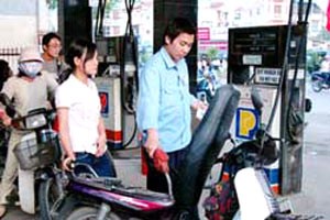 At a gasoline station in District 3, Ho Chi Minh City At a gasoline station in District 3, Ho Chi Minh City
