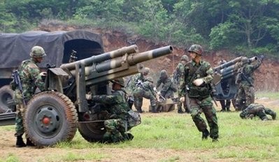 South Korean marines are seen during a drill on Yeonpyeong island in the disputed Yellow Sea. AFP South Korean marines are seen during a drill on Yeonpyeong island in the disputed Yellow Sea. AFP