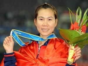 Truong Thanh Hang shows her silver medal in China's Guangzhou Nov. 23 (Photo: Vietnam News Agency) Truong Thanh Hang shows her silver medal in China's Guangzhou Nov. 23 (Photo: Vietnam News Agency)