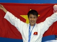 Vu Thi Nguyet Anh grabbed a silver medal in the women's U-50kg division at the Asian Games yesterday. (Photo:VNA) Vu Thi Nguyet Anh grabbed a silver medal in the women's U-50kg division at the Asian Games yesterday. (Photo:VNA)