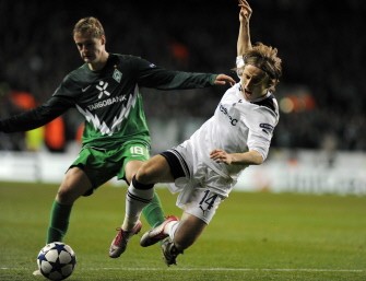 Tottenham Hotspurs' Croatian player Luka Modric (C) is fouled by Werder Bremen's striker Felix Kroos (L) during the match at White Hart Lane in London on November 24, 2010. AFP Tottenham Hotspurs' Croatian player Luka Modric (C) is fouled by Werder Bremen's striker Felix Kroos (L) during the match at White Hart Lane in London on November 24, 2010. AFP