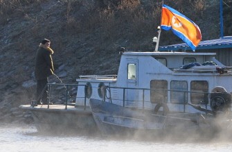 A North Korean soldier on a naval vessel on the banks of the Yalu River some 70 kms north of the North Korean border town of Siniuju which lies across the river from Dandong in northeast China's Liaoning province on November 26, 2010. AFP A North Korean soldier on a naval vessel on the banks of the Yalu River some 70 kms north of the North Korean border town of Siniuju which lies across the river from Dandong in northeast China's Liaoning province on November 26, 2010. AFP