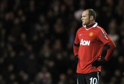 Rooney reacts during the UEFA champions league group C football match against Glasgow Rangers at Ibrox in Glasgow, Scotland, on November 24, 2010. AFP Rooney reacts during the UEFA champions league group C football match against Glasgow Rangers at Ibrox in Glasgow, Scotland, on November 24, 2010. AFP