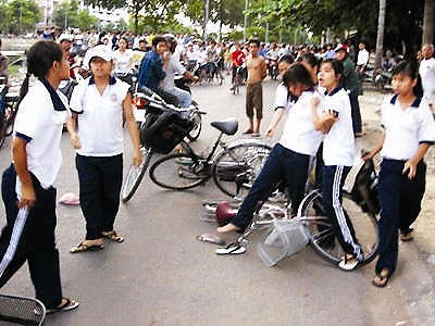 (File) School girls fight in a street (File) School girls fight in a street
