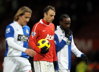 Dimitar Berbatov (2nd L) leaves the pitch with the match ball after scoring five goals in the match. AFP Dimitar Berbatov (2nd L) leaves the pitch with the match ball after scoring five goals in the match. AFP