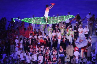 A child performer is hoisted aloft during the closing ceremony for the 16th Asian Games in Guangzhou on November 27, 2010. AFP A child performer is hoisted aloft during the closing ceremony for the 16th Asian Games in Guangzhou on November 27, 2010. AFP