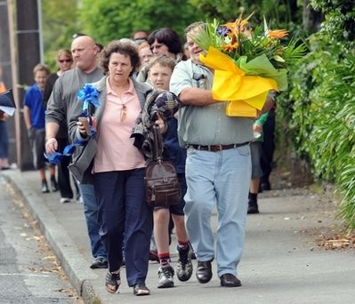 Family members walk to catch their buses to visit the Pike River Coal mine where 29 miners are killed after being trapped underground following an explosion in Greymouth, New Zealand, Saturday, Nov. 27, 2010 Family members walk to catch their buses to visit the Pike River Coal mine where 29 miners are killed after being trapped underground following an explosion in Greymouth, New Zealand, Saturday, Nov. 27, 2010