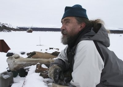 In this photo taken Oct. 23, 2010 Russian scientist Sergey Zimov talks about mammoth bones he has collected in this remote area of northeast Siberia. In this photo taken Oct. 23, 2010 Russian scientist Sergey Zimov talks about mammoth bones he has collected in this remote area of northeast Siberia.